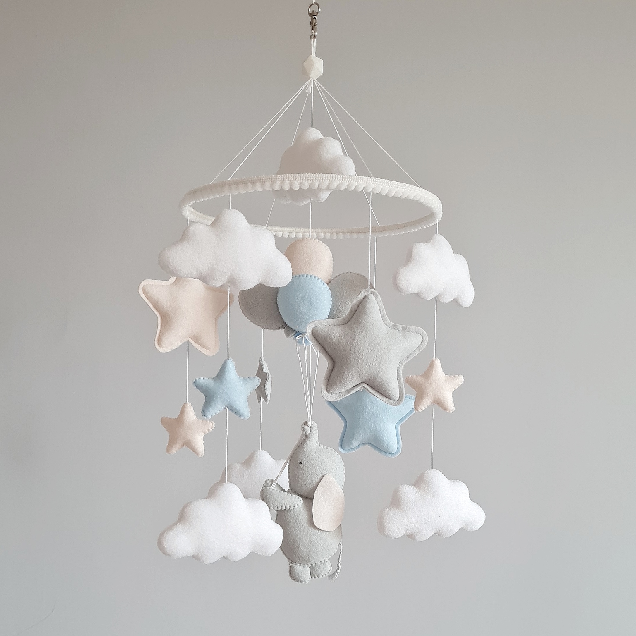Blue baby mobile with elephant and stars