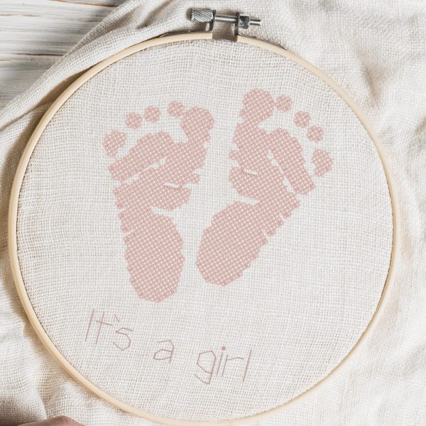 pink footprints of a newborn girl cross stitch pattern