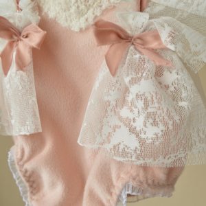 6-12 month girl romper in pale pink and white colours. Baby photo prop