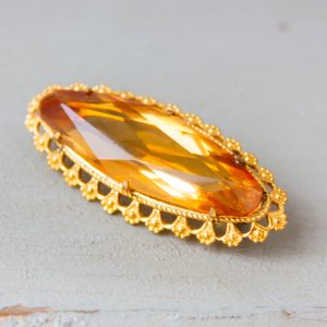Vintage gold tone brooch Yellow topaz pin Oval crystal brooch