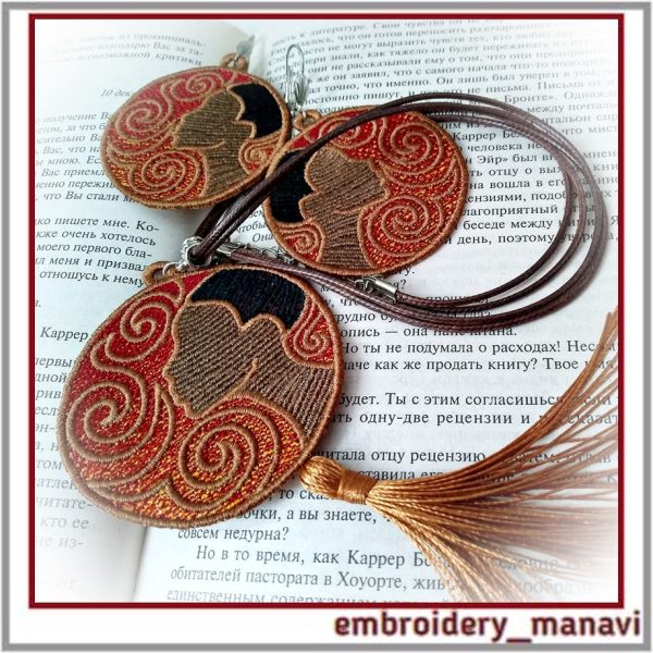 FSL Embroidered African woman face on earrings and pendant.