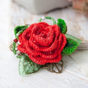 Textile rose brooch
