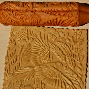 Embossed rolling pin with parrot engraving