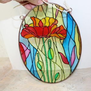 Suncatcher “Bright red flower on glass”