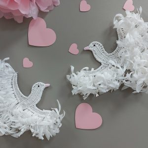 Two wicker white doves
