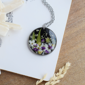 Flower glade necklace. Summer pendant in resin with wildflowers