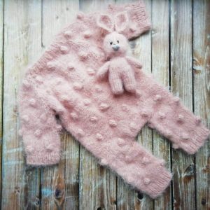 A romper with “bubbles” and a bunny toy (color dusty rose)