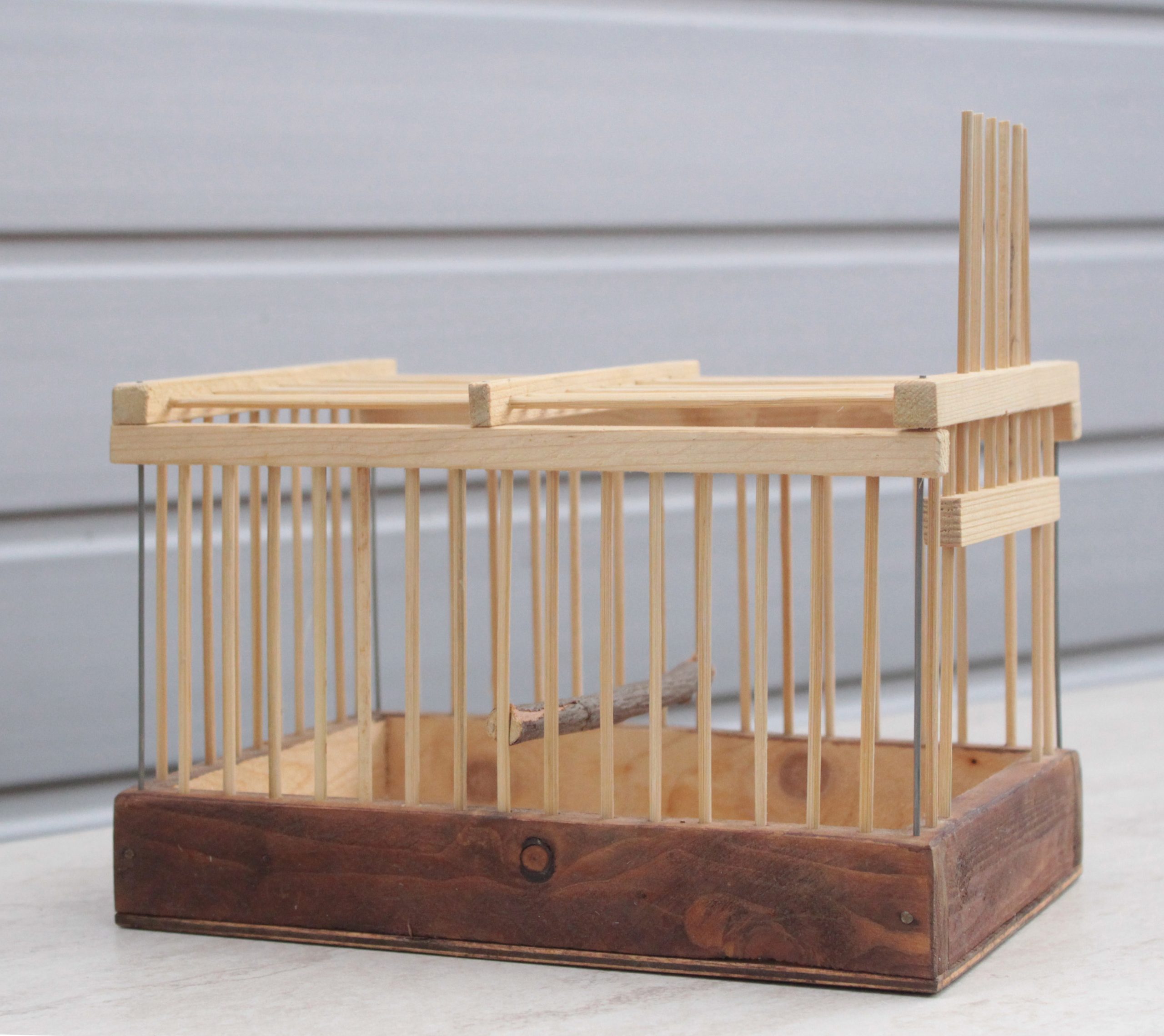 small wooden bird cage