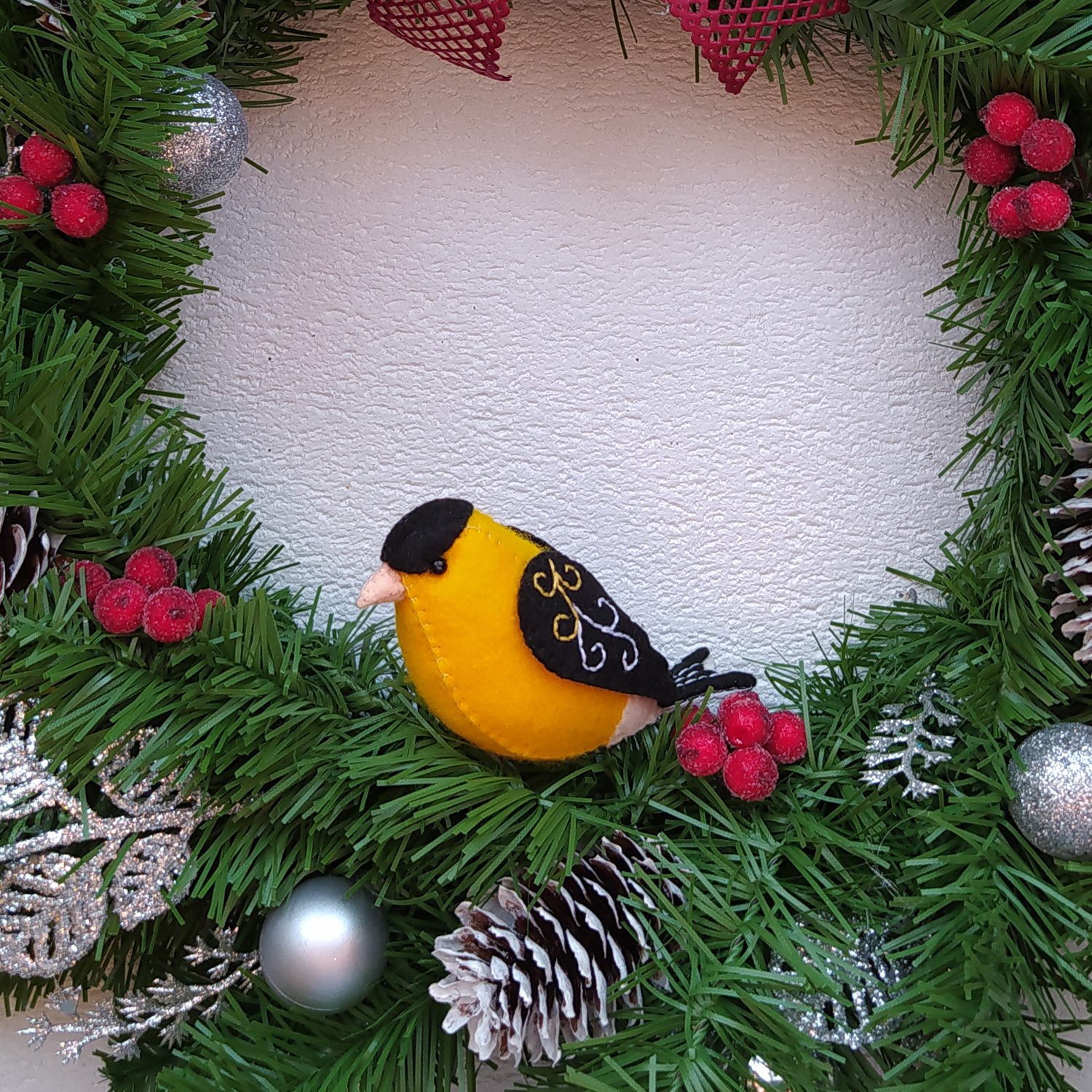 Christmas wreath with bird