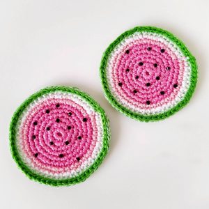 Cute car coasters in the shape of fruit, crocheted from cotton.