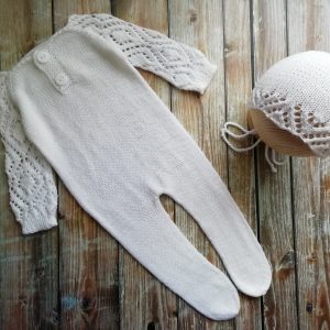 Set with openwork sleeves and a matching cap