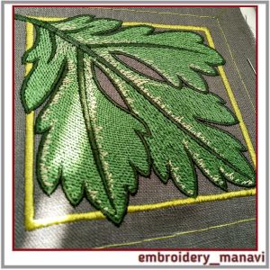 Embroiderydesignsheetinaframeandquiltblockapplique