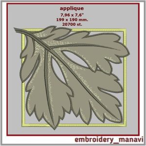 Embroidery design sheet in a frame and quilt block applique.