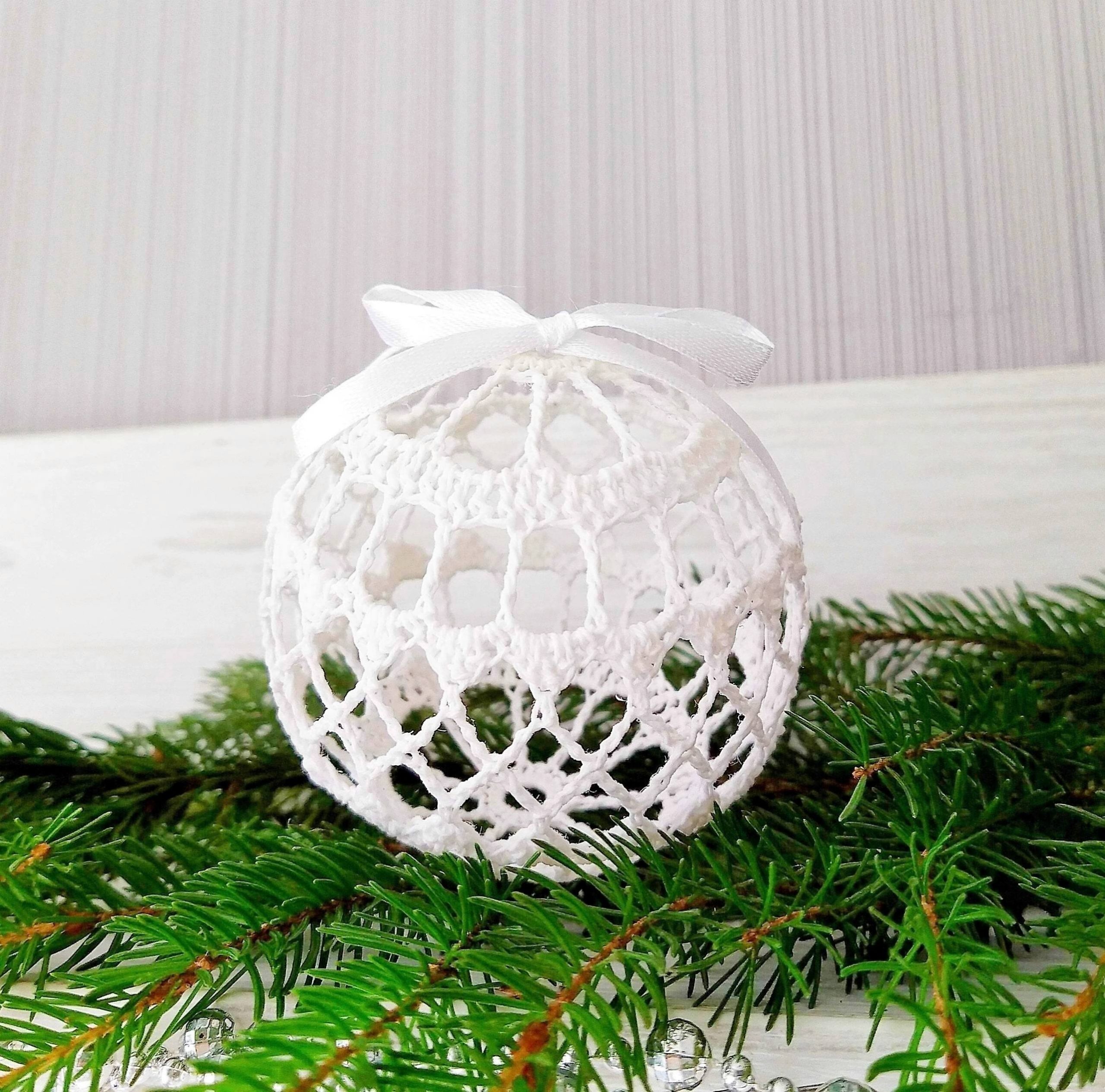 White Christmas balls ornaments gift sets. These amazing crochet handmade Christmas baubles are made from natural thread, then blocked for to stand in a ball shape. You can see through their lacy design because there is no filling inside. Christmas balls 3d look great on Christmas tree or just in decorative plate on the table. Also Christmas baubles can make amazing Christmas gift for beloved person. 4 different design available to pick from when placing your order. I ship these in a solid box.