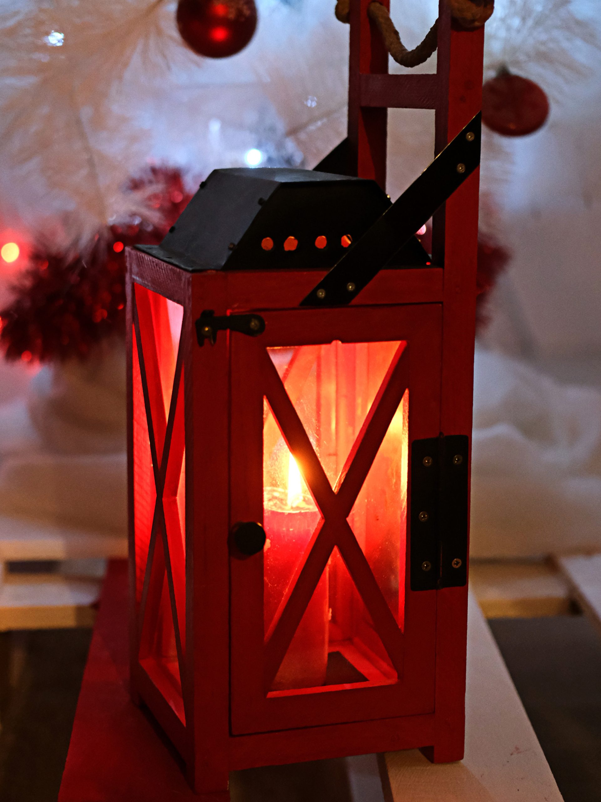 Red candle lantern with candle