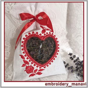 Embroidery_design_of_a_heart_shaped_window_with_flowers