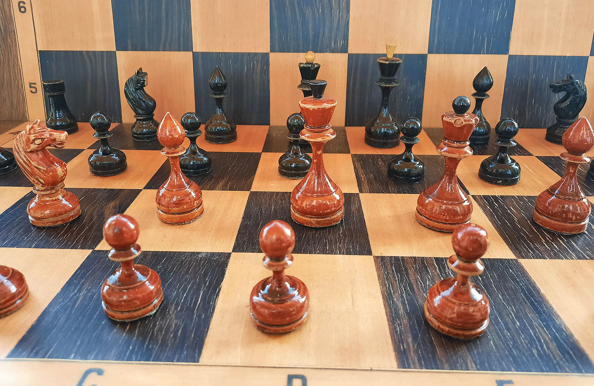 Classic Wooden Tournament chess set on black background