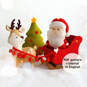 Felt toys - Christmas tree near the reindeer Rudolph with Santa's sleigh with Santa Claus in it.