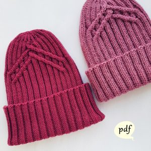accented hat knitting pattern for 2 sizes ribbed hat with cabled crown