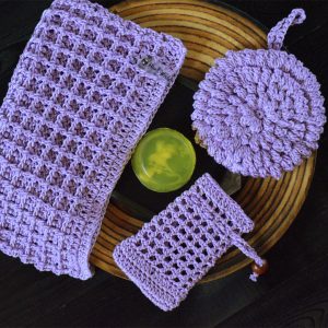 spa set for caring for sensitive and allergic skin organic cosmetics with natural oil lavender color washcloths and towel of light lavender and lilac colors crocheted handmade eco