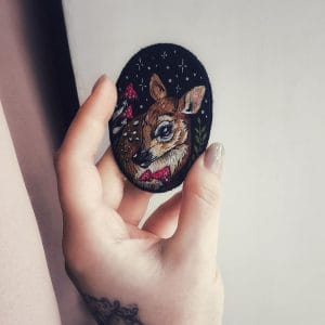"Little Deer" - handmade embroidered brooch, brooch in hands, natural size