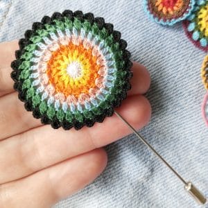 sunbeam-mandala-brooch-micro-crochet-cycle-of-light-1-2