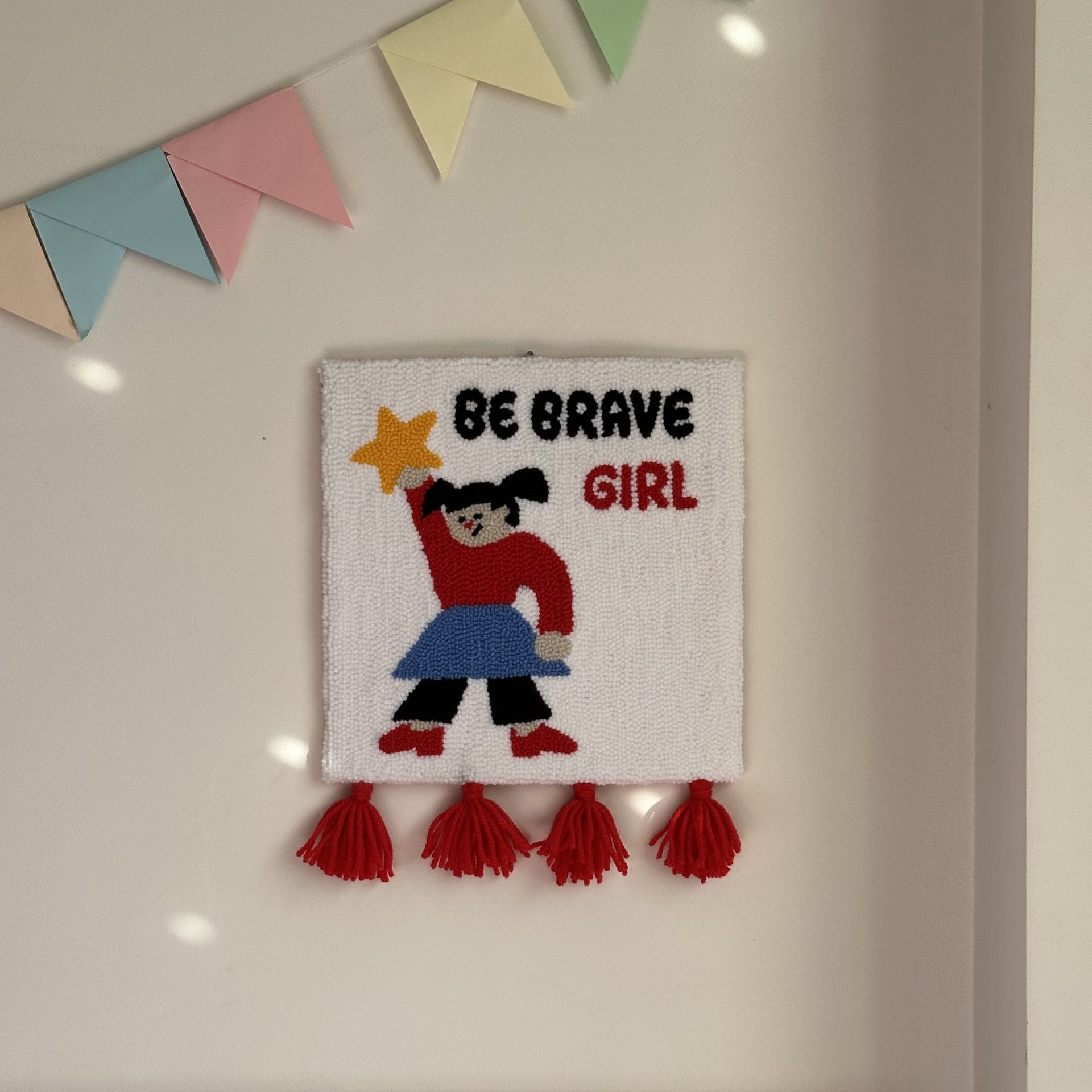 Punch Needle Wall Hanging “Be Brave Girl” Handmade Textile Art 2 “Be Brave Girl” punch needle wall hanging with paper garland decor