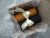 Set of colored candles made of natural wax. Black and gold candles