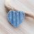 Broken blue sea glass heart