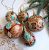 A set of hand-painted Christmas tree ornaments