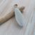 White genuine sea glass stopper stem with a light blue tip