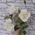 Cold porcelain Rose hip realistic flowers Delicate flowers in vase