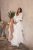 Sweetheart lace wedding dress. Long sleeves with pearl buttons dress.
