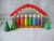 Rainbow Peg dolls in Wooden house toy for toddler