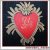 Machine embroidery design heart with crown in fiery frame.