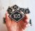 Black number sign 103 – small rhomb address plate vintage