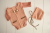 Newborn boy rust romper and hat outfit photography prop